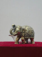 Fully Decorated Elephant with Bell and Upraised Trunk
